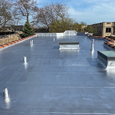 Aluminum-Coating-for-Flat-Roofs-in-Chicago-Enhance-Your-Roofs-Durability-and-Longevity 1