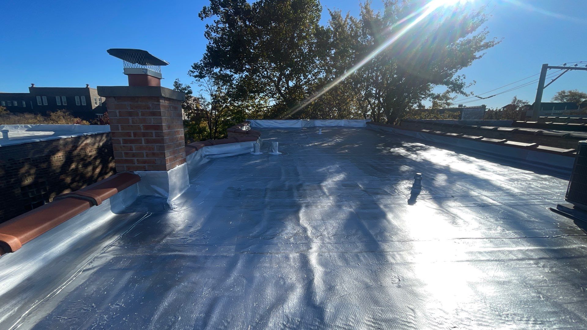 Benefits of Aluminum Coating for Flat Roofs in Chicago