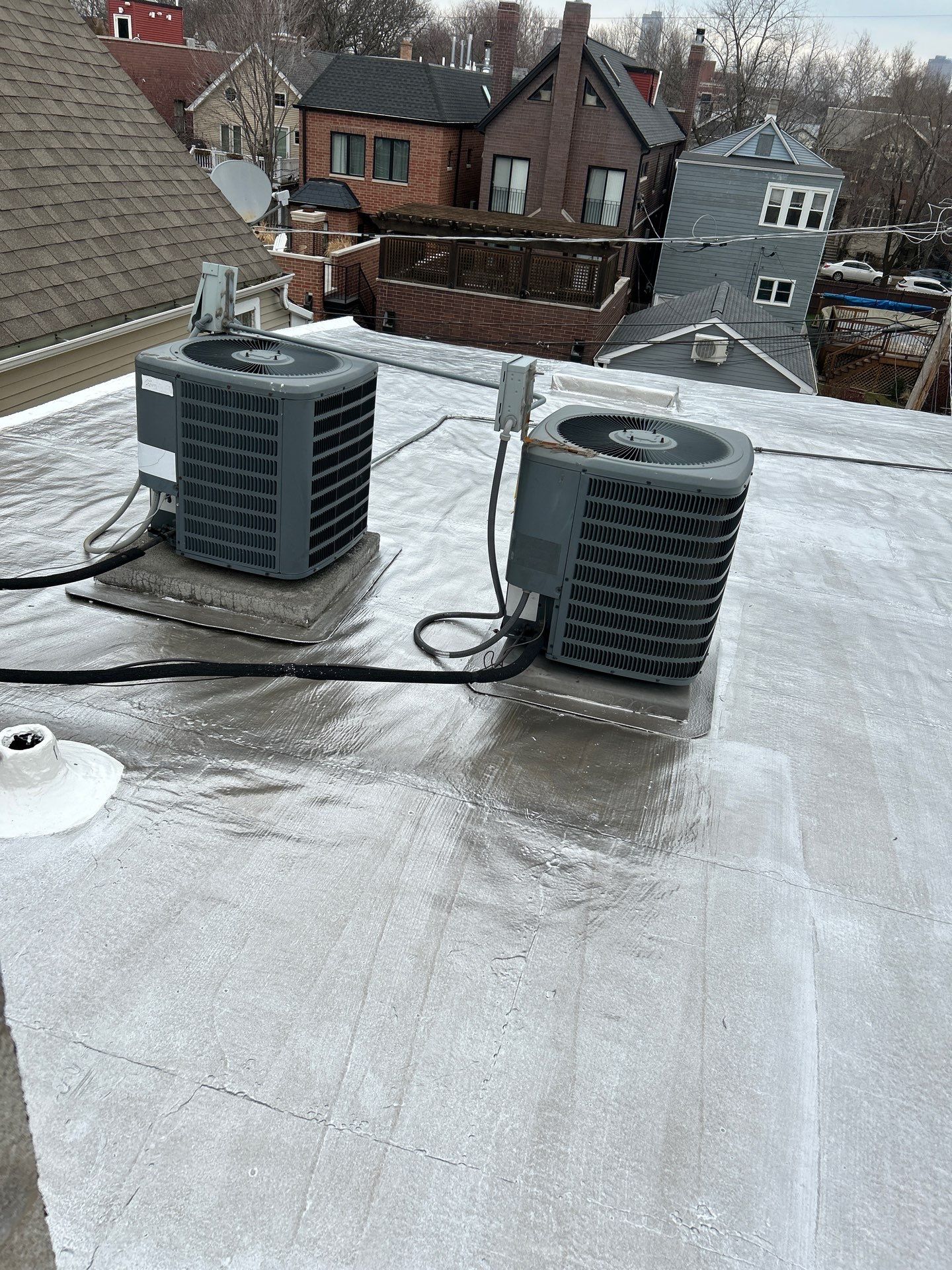 Chicago Low-Slope Roof Repair: Installing Protective Membrane Under HVAC Condensers