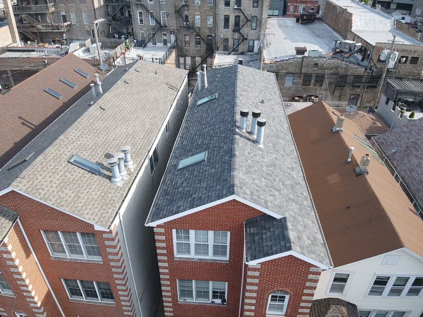 Chicago Shingle Roof and Skylight Replacement by Anchor Point Roofing: Quality You Can Trust