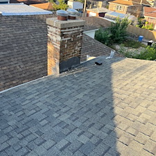 Chimney-Cricket-Installation-for-Leak-Protection-on-Shingle-Roofs 4