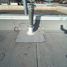 Common-Causes-of-Flat-Roof-Leaks-Around-Vents-in-Wilmette 1