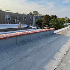 Cracked-or-Broken-Clay-Tile-on-Your-Flat-Roof-Expert-Repairs-in-Chicago 0