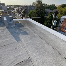 Edge-Flashing-Repairs-for-Flat-Roofs-in-Chicago-Membrane-Pulling-Away 0