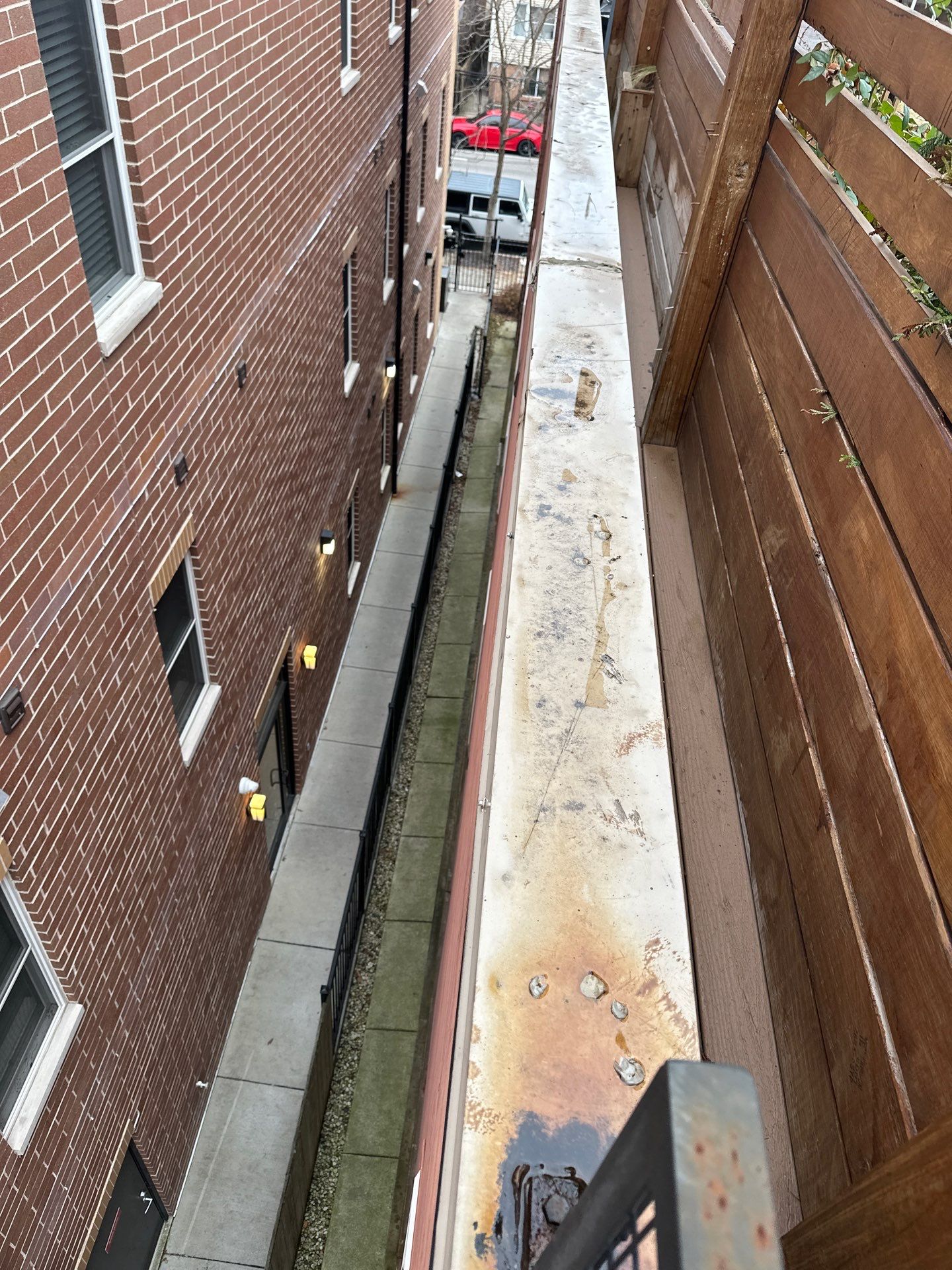 Fix Leaks on a Flat Roof Caused by Old, Damaged Metal Coping – Anchor Point Roofing Solutions