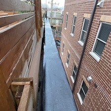 Fix-Leaks-on-a-Flat-Roof-Caused-by-Old-Damaged-Metal-Coping-Anchor-Point-Roofing-Solutions 5