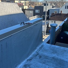 Fix-Leaks-on-a-Flat-Roof-Caused-by-Old-Damaged-Metal-Coping-Anchor-Point-Roofing-Solutions 2