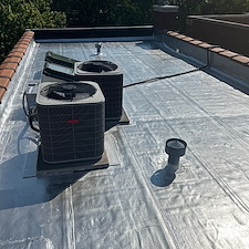 Flat-Roof-Damage-in-Chicago-HVAC-Condenser-Tears-Membrane-Repair-Tips-and-Prevention 2