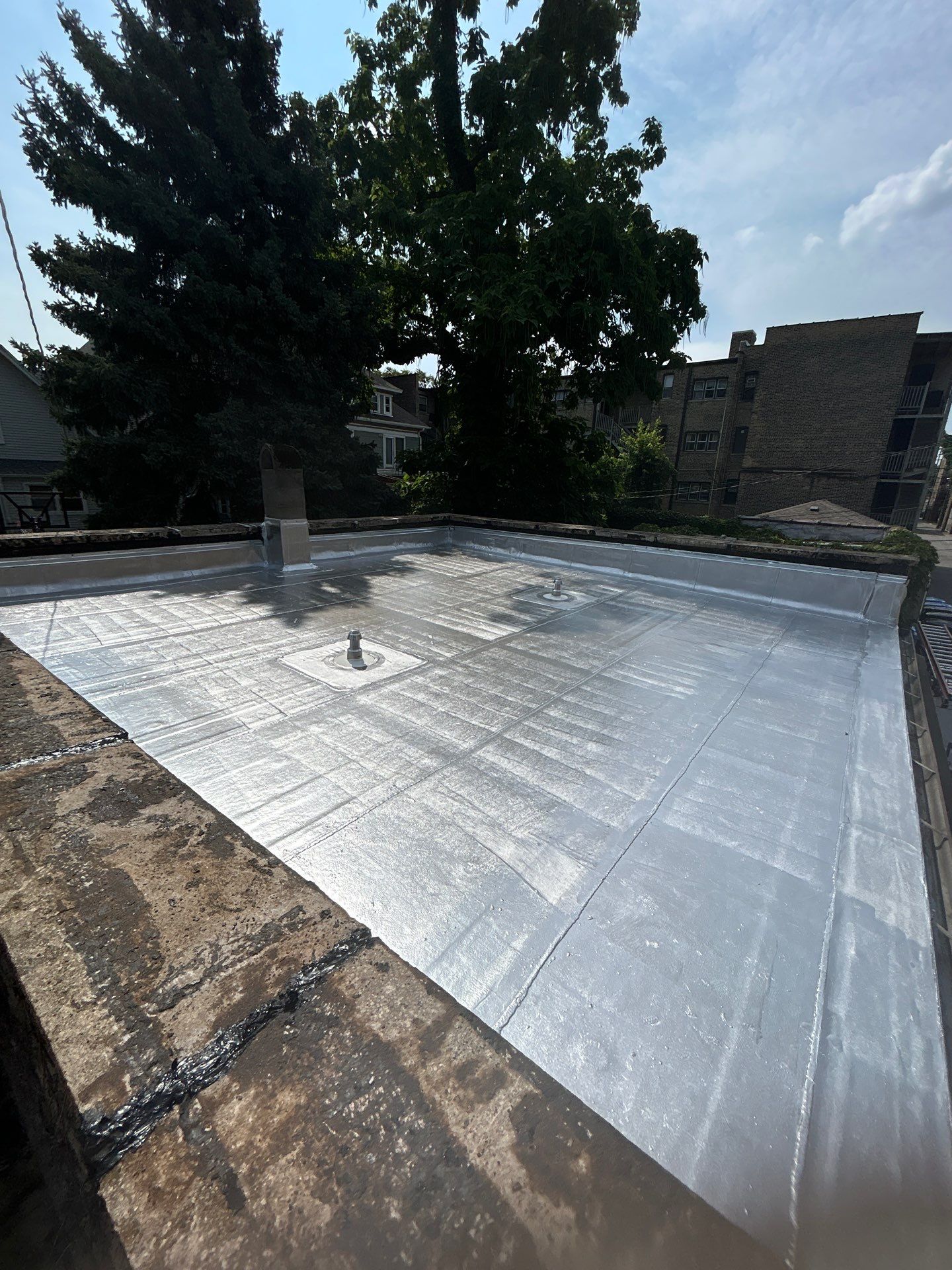 Flat Roof Garage Leaking? Get Expert Roof Replacement in Chicago | Anchor Point Roofing