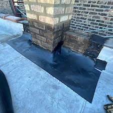 Flat-Roof-Leak-Around-Chimney-in-Chicago-Unsealed-Membrane-Could-Be-the-Cause 4