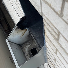 Flat-Roof-Leak-in-Chicago-Due-to-Membrane-Pulling-Away-from-Drain-or-Scupper 0