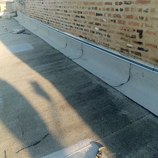 Flat-Roof-Leak-Repair-in-Chicago-Fixing-Unadhered-Membrane-Issues 3