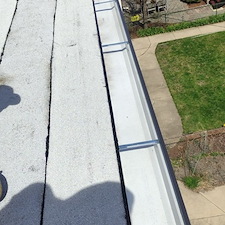 Flat-Roof-Leak-Solutions-Fixing-Loose-Membranes-Along-the-Gutter 2