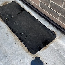 Flat-Roof-Leaking-in-Chicago-Water-Trapped-Under-Membrane-Anchor-Point-Roofing-Can-Help 2