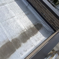 Flat-Roof-Leaking-in-Chicago-Water-Trapped-Under-Membrane-Anchor-Point-Roofing-Can-Help 5