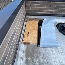 Flat-Roof-Leaking-in-Chicago-Water-Trapped-Under-Membrane-Anchor-Point-Roofing-Can-Help 4