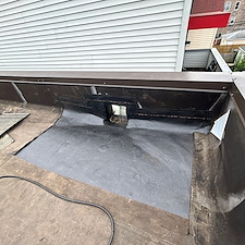 Flat-Roof-Leaking-Loose-Membrane-Around-the-Drain-Could-Be-the-Issue-Chicago-Roofing-Experts 7