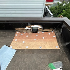 Flat-Roof-Leaking-Loose-Membrane-Around-the-Drain-Could-Be-the-Issue-Chicago-Roofing-Experts 8