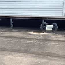 Flat-Roof-Leaking-Loose-Membrane-Around-the-Drain-Could-Be-the-Issue-Chicago-Roofing-Experts 9