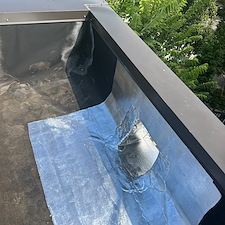 Flat-Roof-Leaking-Loose-Membrane-Around-the-Drain-Could-Be-the-Issue-Chicago-Roofing-Experts 1