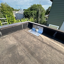 Flat-Roof-Leaking-Loose-Membrane-Around-the-Drain-Could-Be-the-Issue-Chicago-Roofing-Experts 0