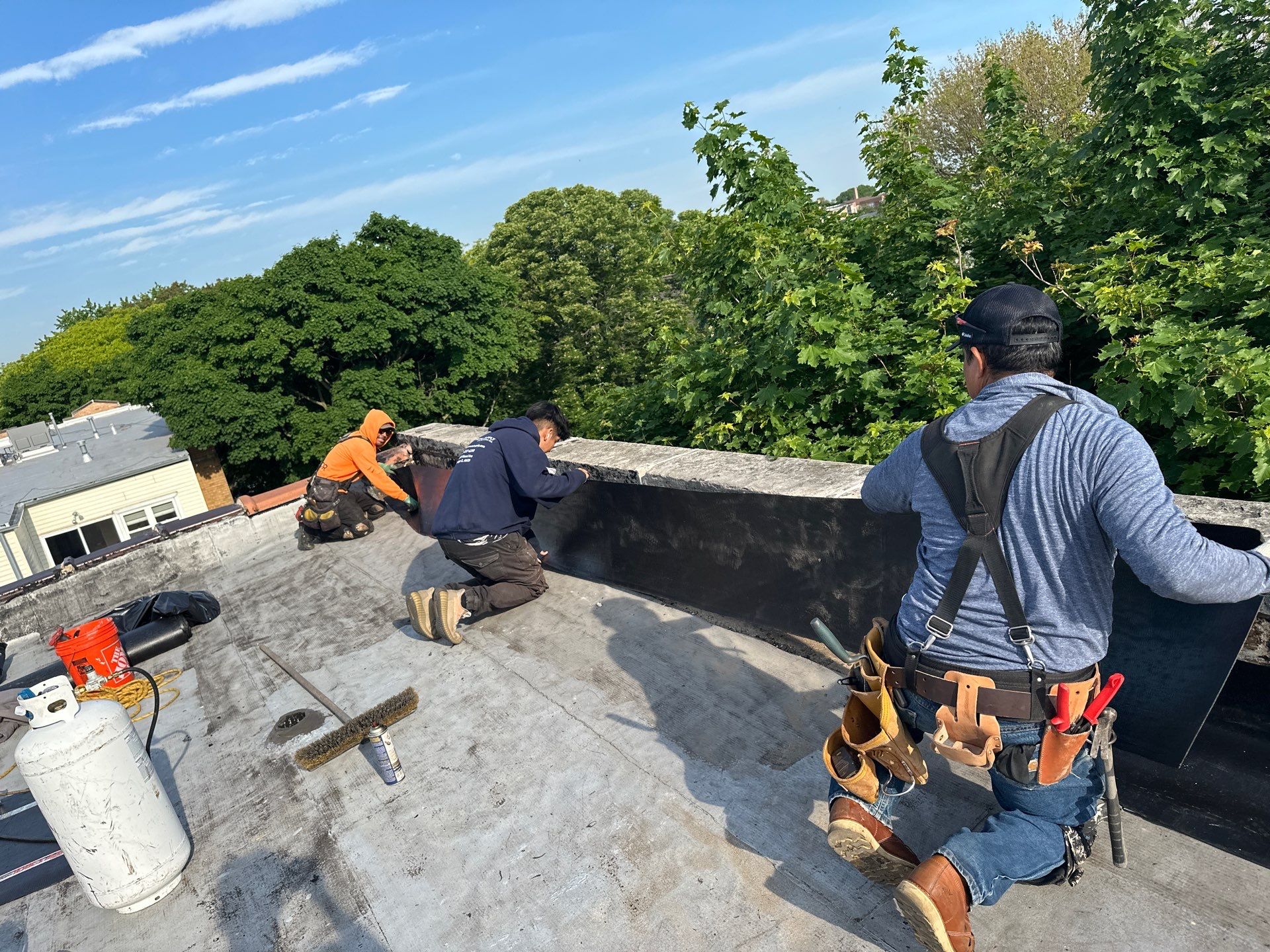 Flat Roof Leaks in Chicago? Address Loose Membrane Issues on Wall Flashing Today!