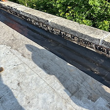 Flat-Roof-Leaks-in-Chicago-Address-Loose-Membrane-Issues-on-Wall-Flashing-Today 2