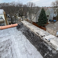 Flat-Roof-Leaks-in-Chicago-Address-Loose-Membrane-Issues-on-Wall-Flashing-Today 3