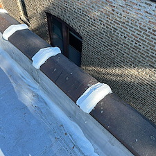 Gaps-in-Clay-Coping-on-a-Flat-Roof-in-Chicago 1