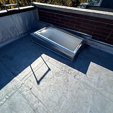 Got-a-Leaky-Skylight-on-Your-Flat-Roof-in-Evanston-Anchor-Point-Roofing-Can-Help 1