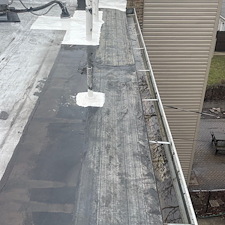 Got-Loose-Membrane-on-Your-Gutter-Area-Let-Anchor-Point-Roofing-Repair-It 1