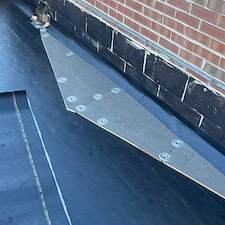 How-to-Fix-Water-Ponding-on-a-Flat-Roof-Solutions-for-Chicagos-Flat-Roofs 1