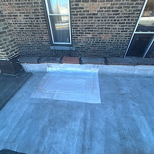 How-to-Properly-Seal-a-Flat-Roof-After-Chimney-Removal-Anchor-Point-Roofing 1