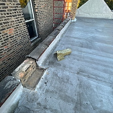 How-to-Properly-Seal-a-Flat-Roof-After-Chimney-Removal-Anchor-Point-Roofing 4