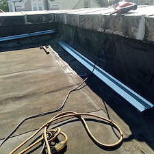 Is-Your-Flat-Roof-Leaking-How-Membrane-Pulling-Away-Can-Cause-Water-Damage 2