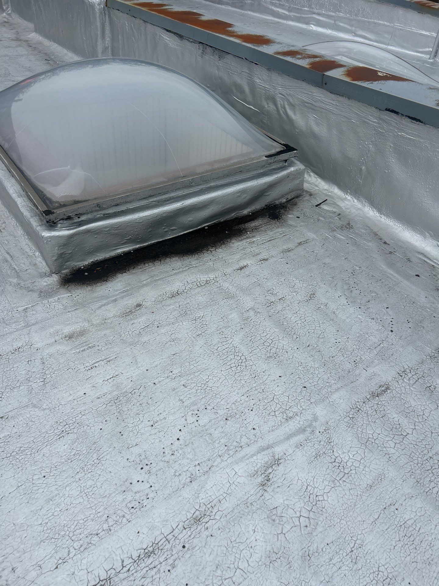 Leak Near Skylight in Chicago Flat Roof: What's Wrong?