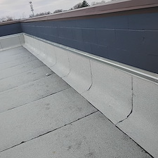 Loose-Membrane-Causing-Chicago-Flat-Roof-Leaks 1