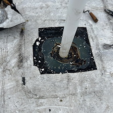 Low-Slope-Roof-Repair-Fixing-Improper-Boot-Installation-on-a-Flat-Roof 2