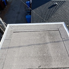 Low-Slope-Roof-Repair-Fixing-Membrane-Pulling-Away-from-Gravel-Stop-Anchor-Point-Roofing 3