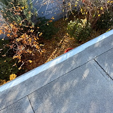 Low-Slope-Roof-Repair-Fixing-Membrane-Pulling-Away-from-Gravel-Stop-Anchor-Point-Roofing 0