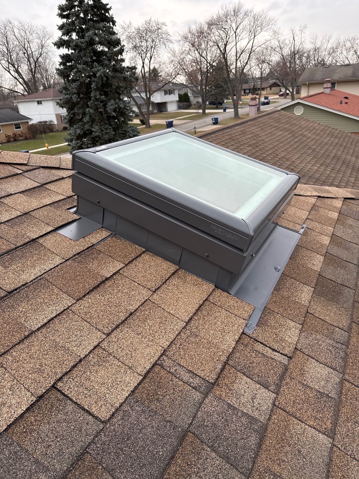 New Skylight Installation on Shingle Roof in Des Plaines: Brighten Your Home Today!