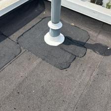 Professional-Low-Slope-Roof-Repair-in-Chicago-Waste-Stack-and-Scupper-Sealing-with-Lucas-6000 0