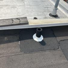 Professional-Low-Slope-Roof-Repair-in-Chicago-Waste-Stack-and-Scupper-Sealing-with-Lucas-6000 1