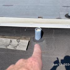 Professional-Low-Slope-Roof-Repair-in-Chicago-Waste-Stack-and-Scupper-Sealing-with-Lucas-6000 4