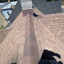 Repairing-Damaged-Ridge-Shingles-in-Chicago 0