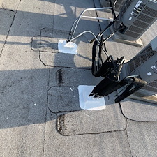 Roof-Leaks-from-HVAC-Sealing-Boxes-Expert-Repairs-in-Chicago 1