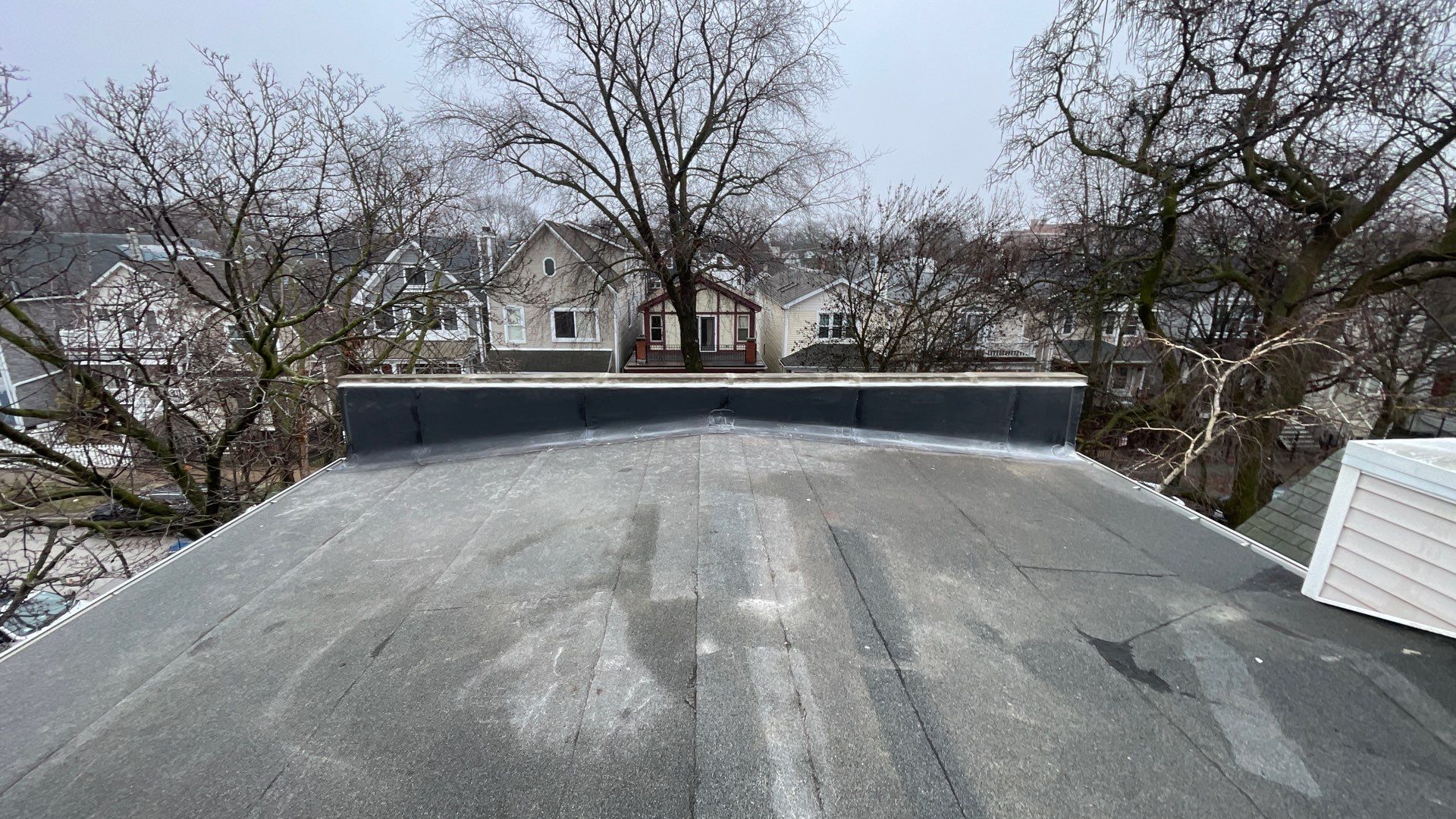 Sealing Head Wall Openings: Roof Repair in Chicago by Anchor Point Roofing